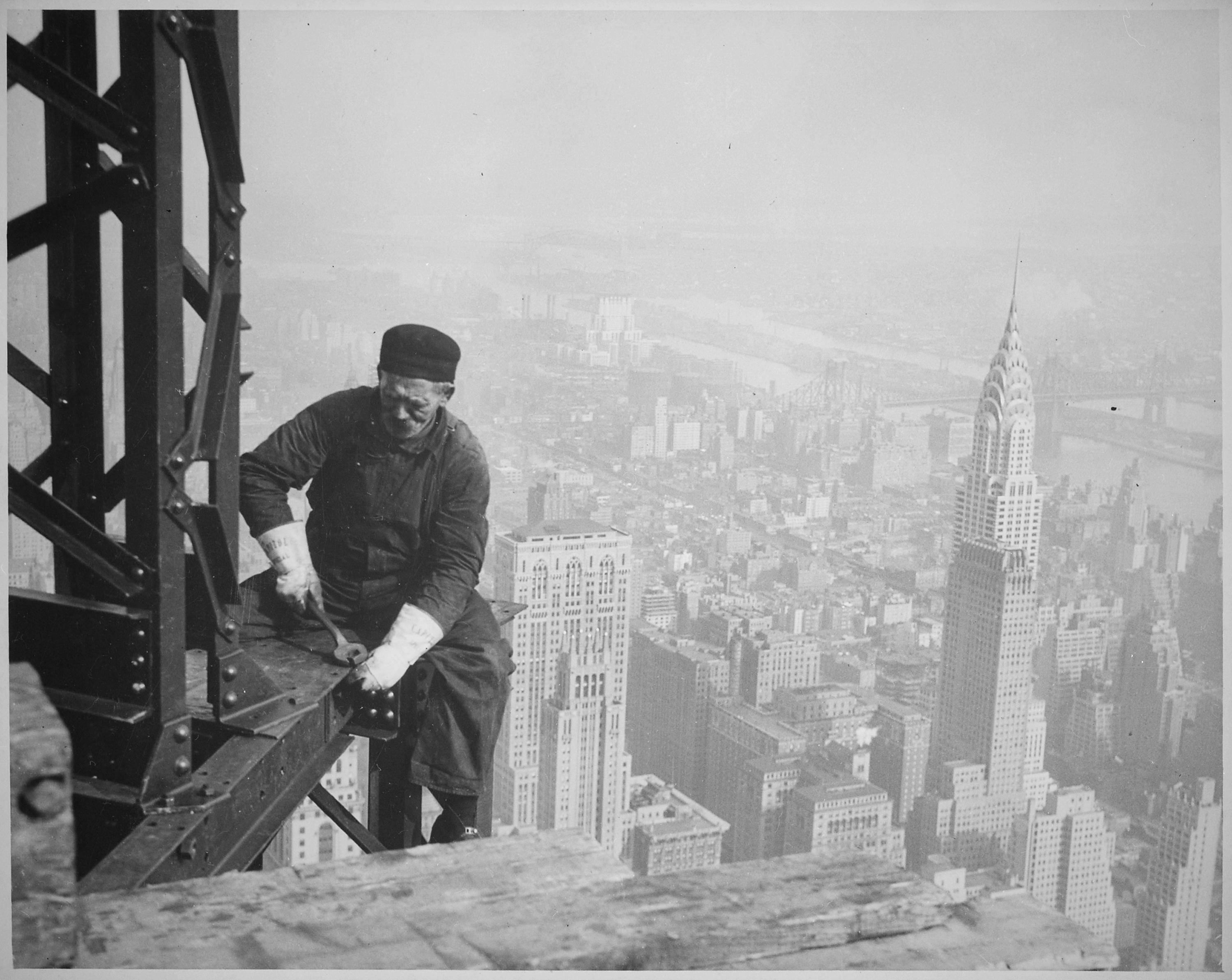 Photograph of a Workman on the Framework of the Empire State Building by Lewis Hine